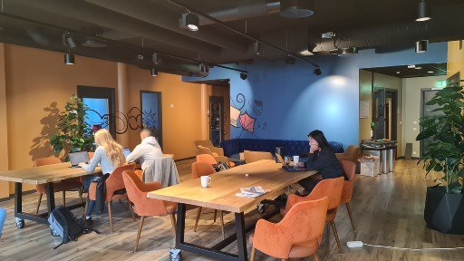 Three students working in the Student Villa